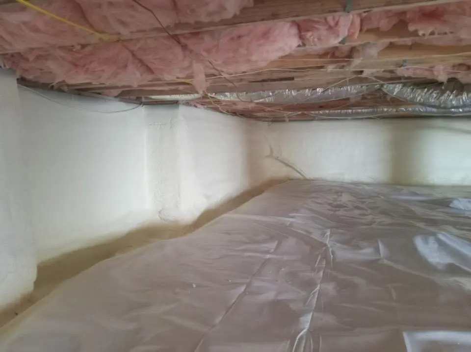 Crawl space encapsulation with closed-cell spray foam for Commercial Roof Restoration in Pompey